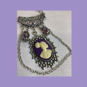 Purple and sliver cameo necklace.